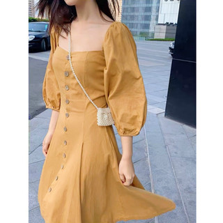 Đầm vàng bò cổ vuông nút dừa (kèm hình thật)