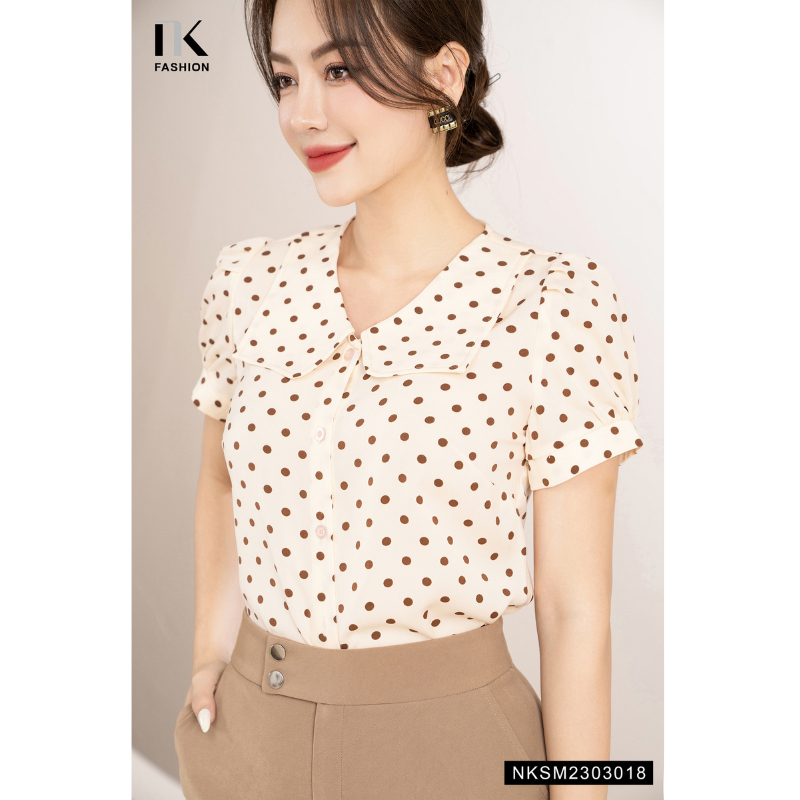 Áo Sơ Mi Nữ NK Fashion Thiết Kế Tay Ngắn Họa Tiết Chấm Bi Cổ Cách Điệu Chất Vải Mềm Mịn Thoáng Mát NKSM2303018