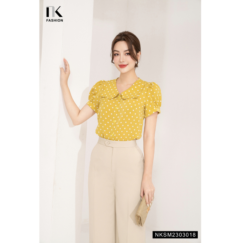 Áo Sơ Mi Nữ NK Fashion Thiết Kế Tay Ngắn Họa Tiết Chấm Bi Cổ Cách Điệu Chất Vải Mềm Mịn Thoáng Mát NKSM2303018