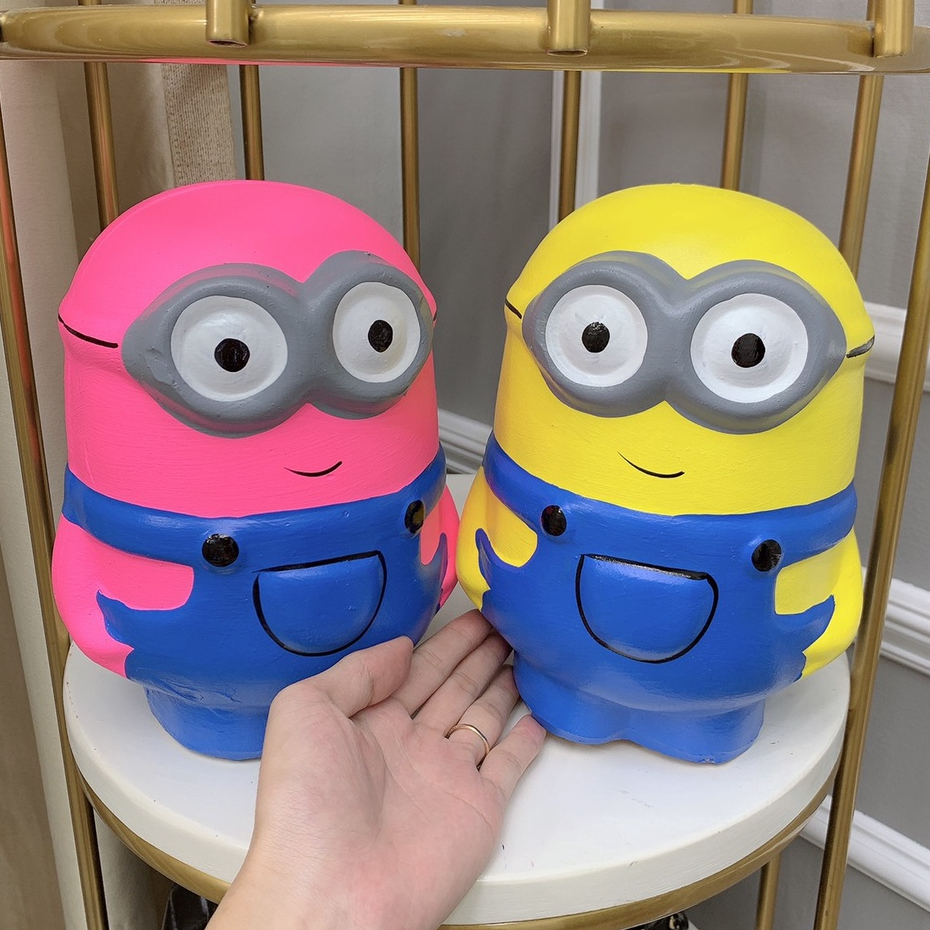 Heo đất tiết kiệm đẹp, ống con lợn đất dễ thương hình minion cao khoảng 20-22cm