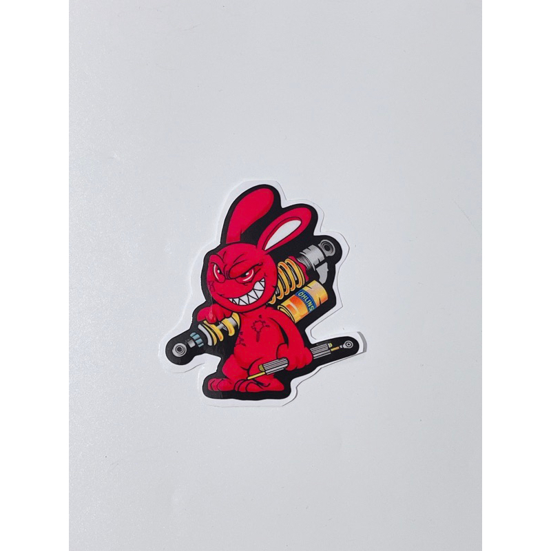 Tem dán hình thỏ điên cầm phuộc Olin, thỏ tay cầm trợ lực kích thước 6x5cm có sẵn keo dán