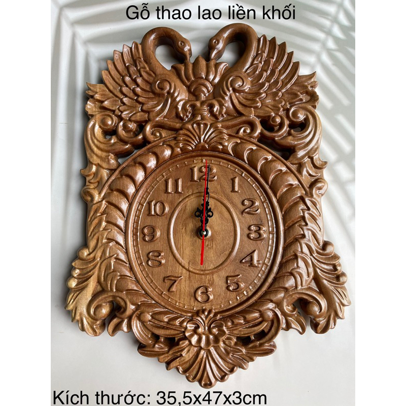 Đồng hồ treo tường Thiên Nga bằng gỗ tự nhiên liền khối, kích thước: 35,5x47x3cm. đồng hồ kim trôi không ồn