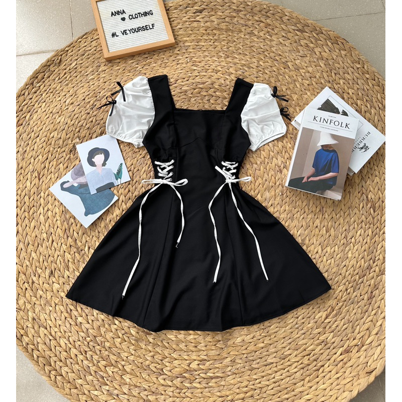Đầm đen phối trắng đan dây (Donda)