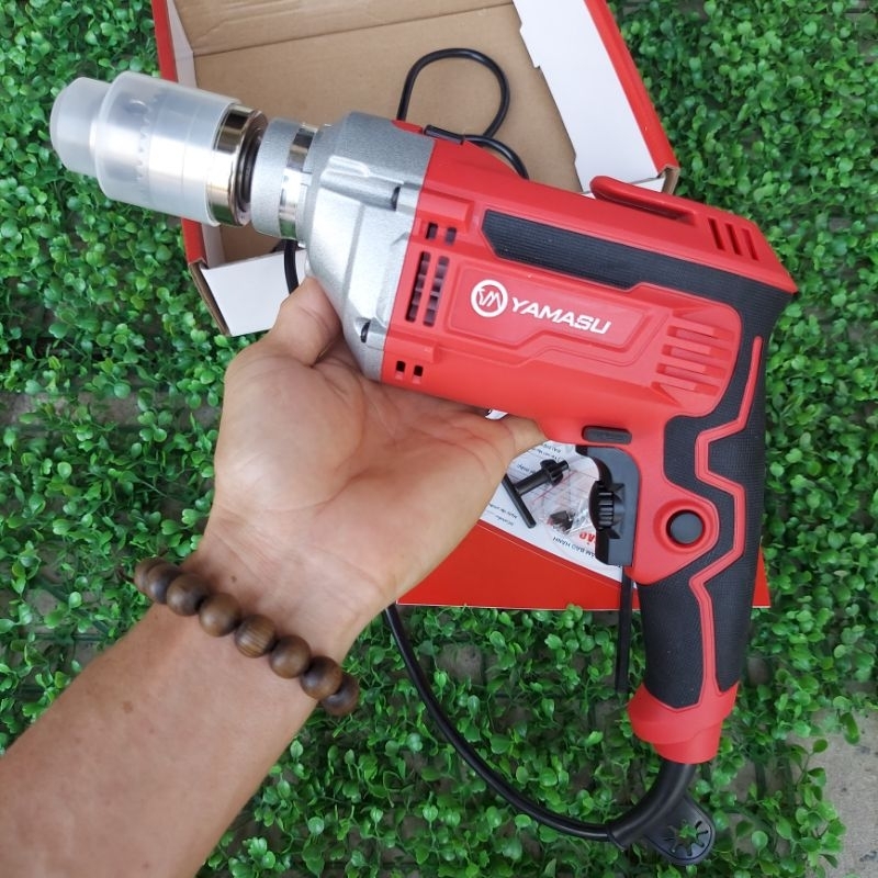 Máy khoan điện Yamasu 13 - 750 - Công suất 750W, có búa, tặng cặp than dự phòng.