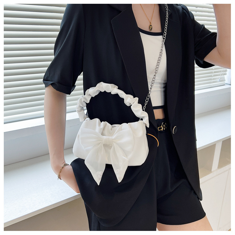 Túi xách đeo chéo quai nhún đính nơ cực xinh cho nàng bánh bèo da PU - T005