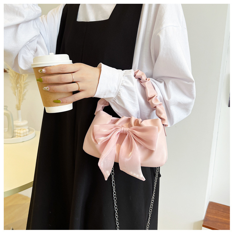 Túi xách đeo chéo quai nhún đính nơ cực xinh cho nàng bánh bèo da PU - T005