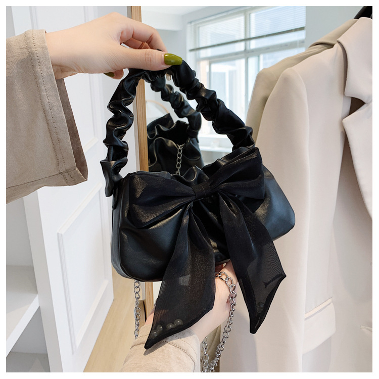 Túi xách đeo chéo quai nhún đính nơ cực xinh cho nàng bánh bèo da PU - T005