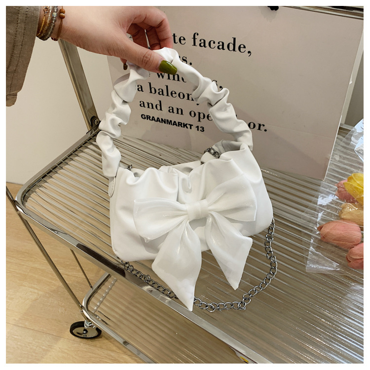 Túi xách đeo chéo quai nhún đính nơ cực xinh cho nàng bánh bèo da PU - T005