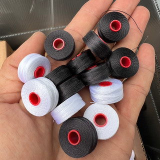Hộp 144 cuộn suốt sợi nilong 210D/3 dùng trong may giày da, balo, túi xách