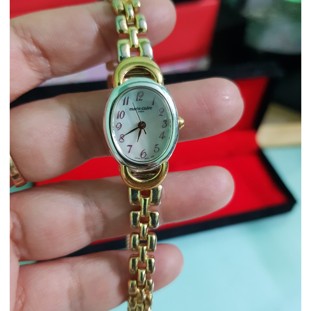Đồng hồ nữ, hiệu marie claire, thương hiệu Pháp,size mặt 18, mặt oval, dạng lắc tay màu vàng, hàng đã qua sử dụng