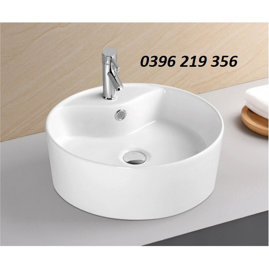 Lavabo nhà tắm trắng dáng tròn-lavabo đặt bàn đá