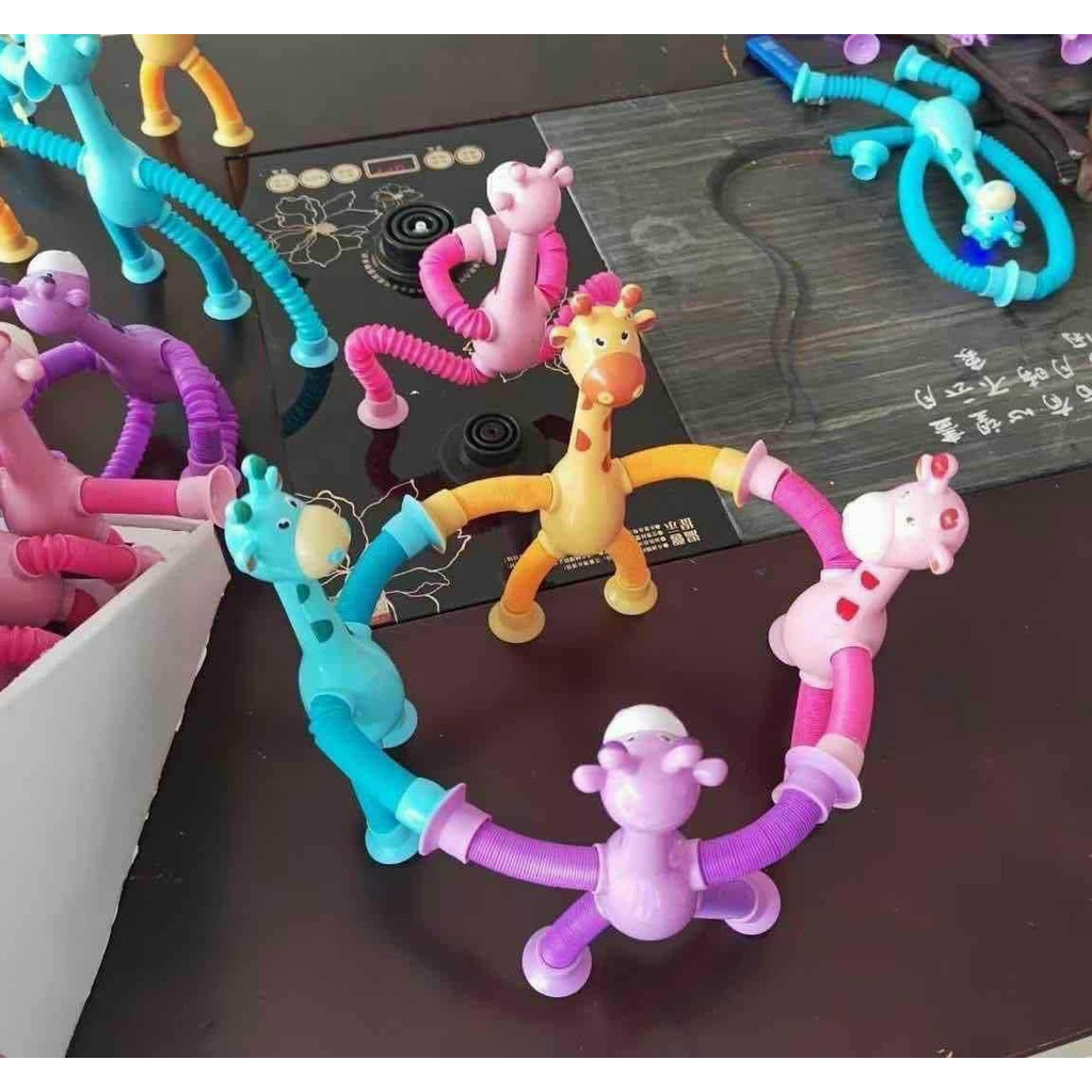 ĐỒ HƠI HUGGY,WUGGY ỐNG LÒ XO CÓ ĐÈN NHÁY