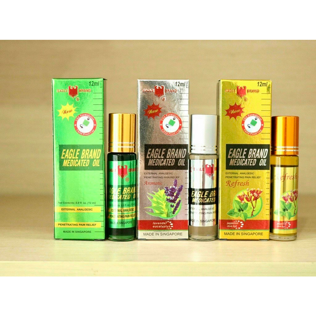 Dầu gió Dạng lăn màu Vàng Singapore Eagle Brand Medicated Oil 12ml Singapore (NEW).