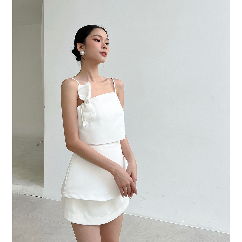 BBSTORE'S Áo Peplum Hai Dây Phối Nơ Đắp Tà Xéo -A1913