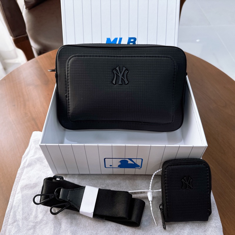 Túi đeo chéo NY new 2023 một màu đen lì - Có kèm ví nhỏ và dây vải đeo chéo - Fullbox như ảnh  size 24cm