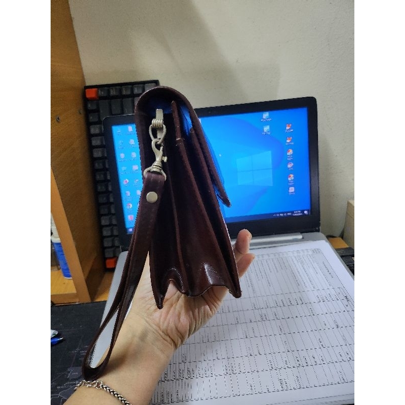 Ví cầm tay da thật