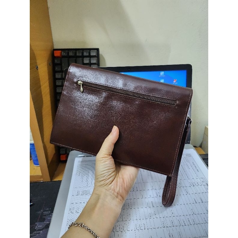 Ví cầm tay da thật