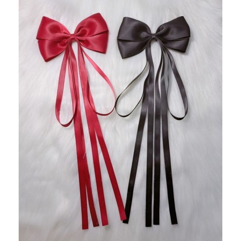 Kẹp tóc  nơ đuôi tua rua tông màu ngọt ngào