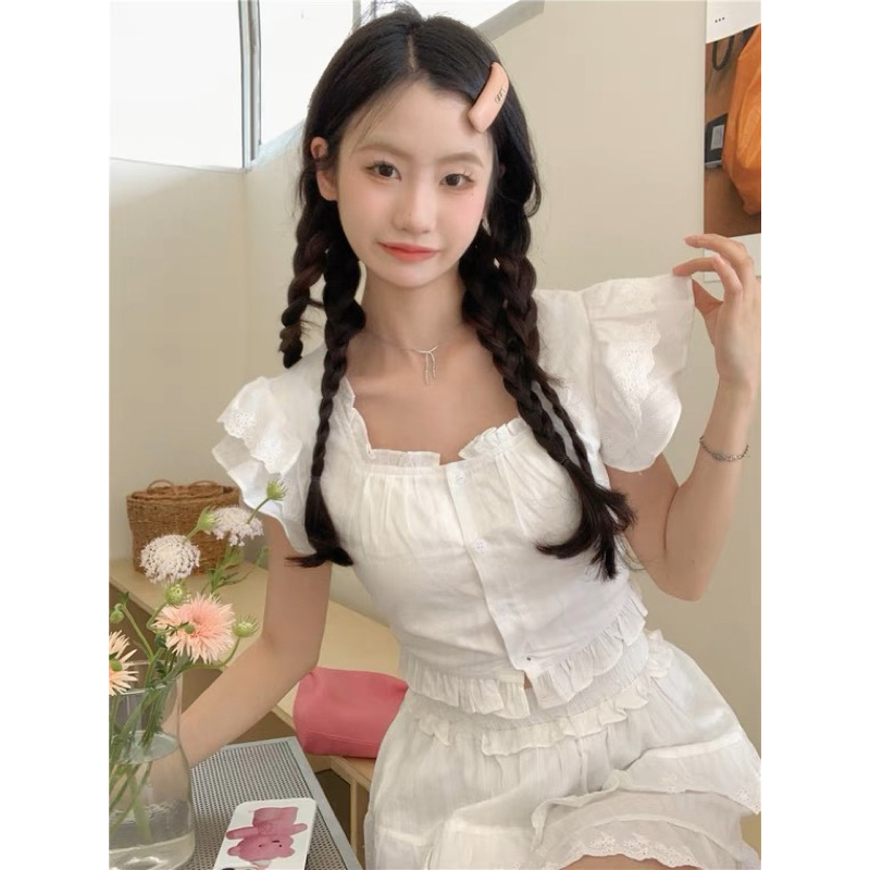 Set áo ngắn tay và chân váy ba tầng năng động mùa hè mài trắng siêu tiểu thư