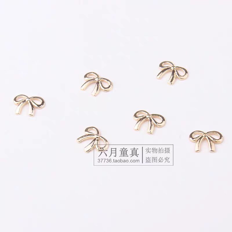 Charm nơ vàng nail,charm nơ trang trí móng kim loại