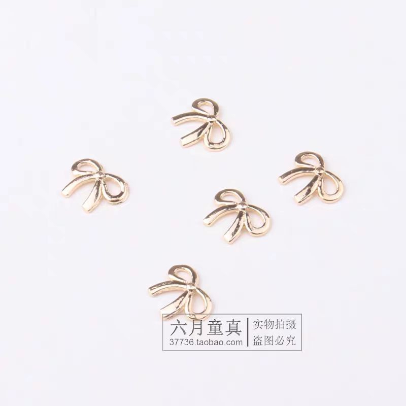 Charm nơ vàng nail,charm nơ trang trí móng kim loại