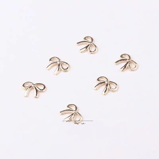 Charm nơ vàng nail,charm nơ trang trí móng kim loại