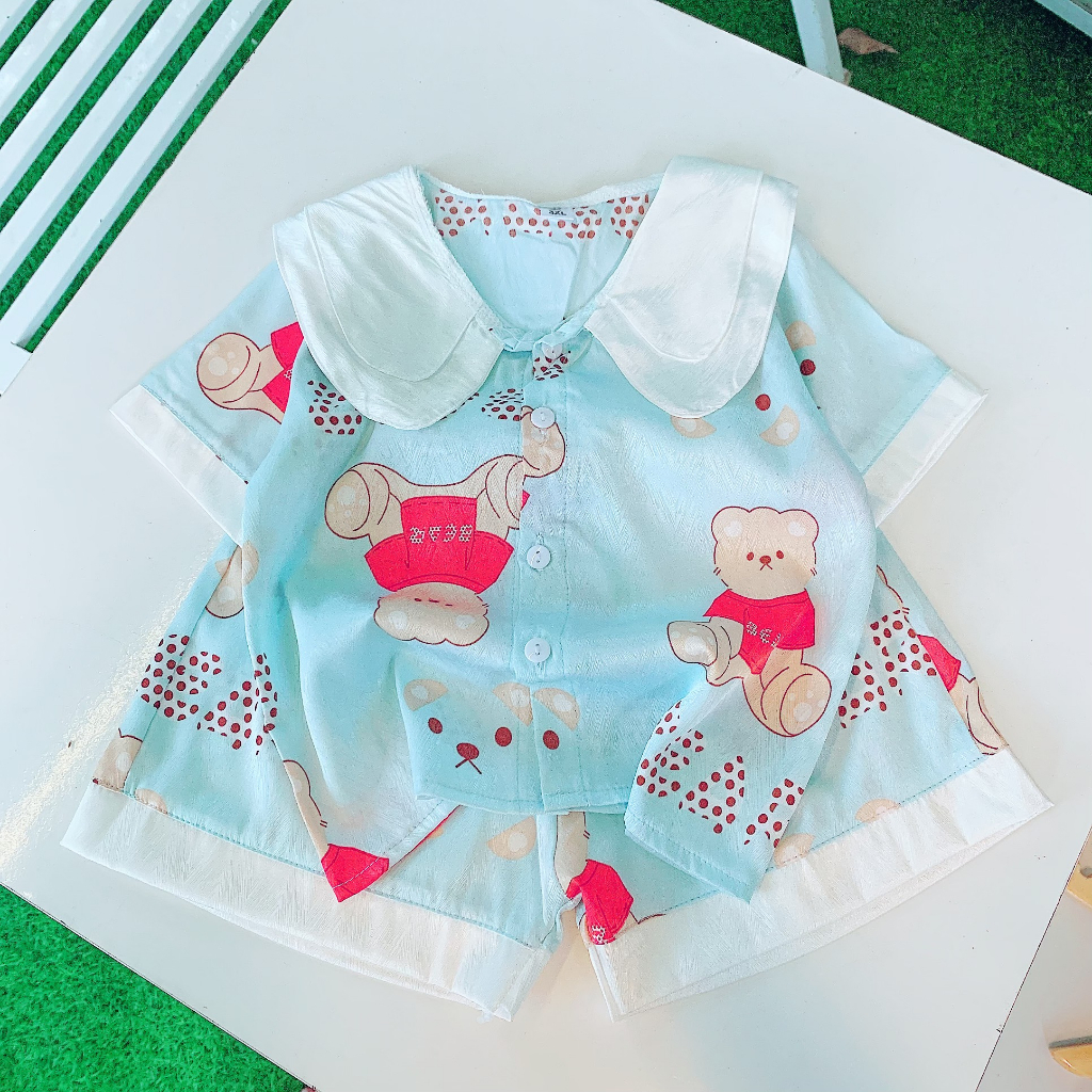 Bộ quần áo bé gái kiểu pijama vải lụa xước 15kg đến 25kg