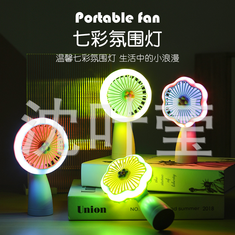 Quạt Sạc USB Mini Tích Điện Cầm Tay Hình Bông Hoa Có Đèn Sáng Nhiều Màu Sáng Tạo Dễ Thương