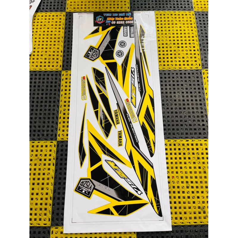 TEM XE EXCITER 150 Y15zr VÀNG ĐEN