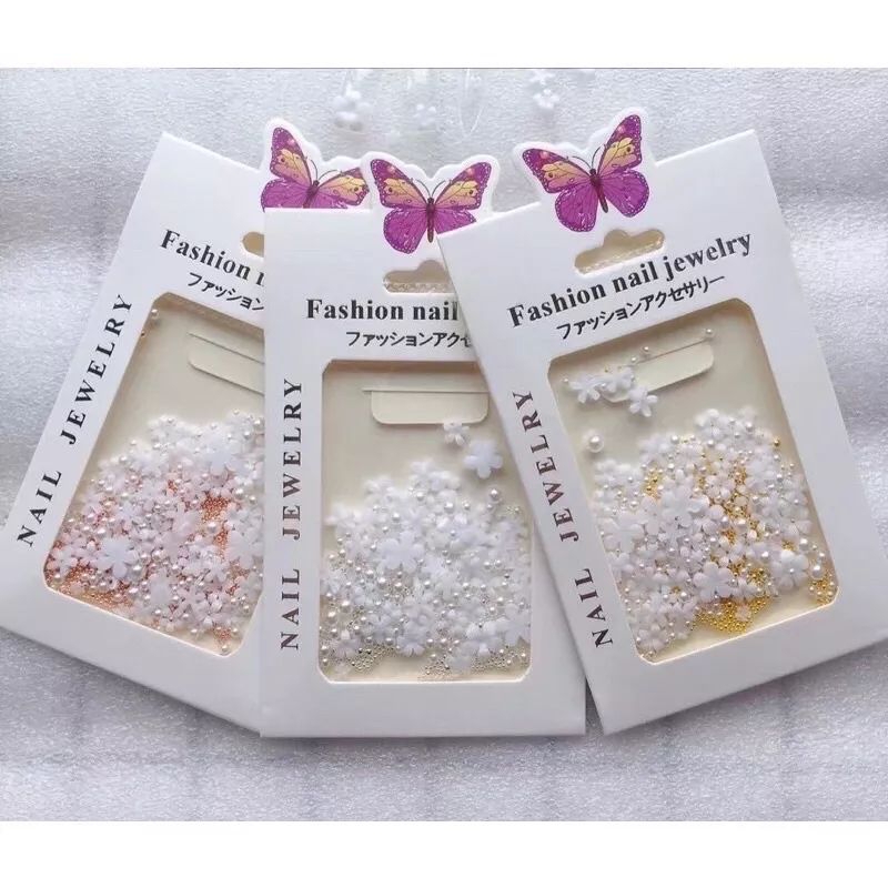 Sỉ***charm túi hoa sứ mix bi vàng nhiều size
