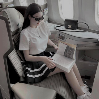 Set áo trắng chân váy xếp li mac check code mai phương bùi