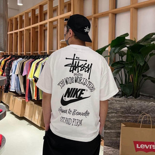 Áo thun ni.ke x stussy the wide world tribe tee shirt