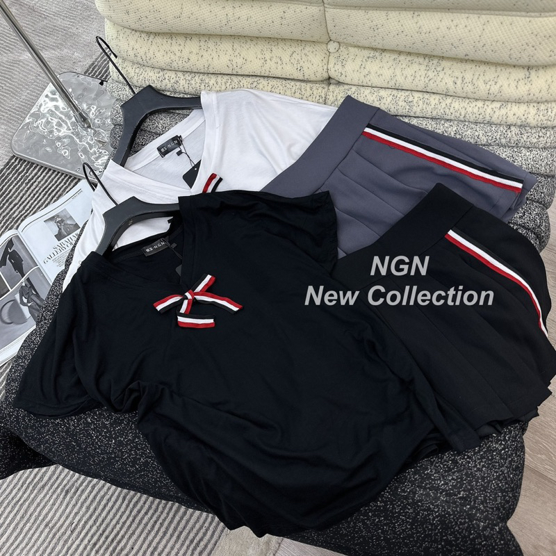 Sét áo phông cổ tim đính nơ+ chân váy Thome xếp li