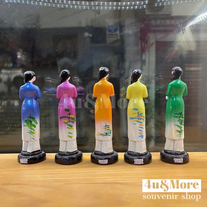 Tượng gốm cô gái áo dài nón lá trang trí