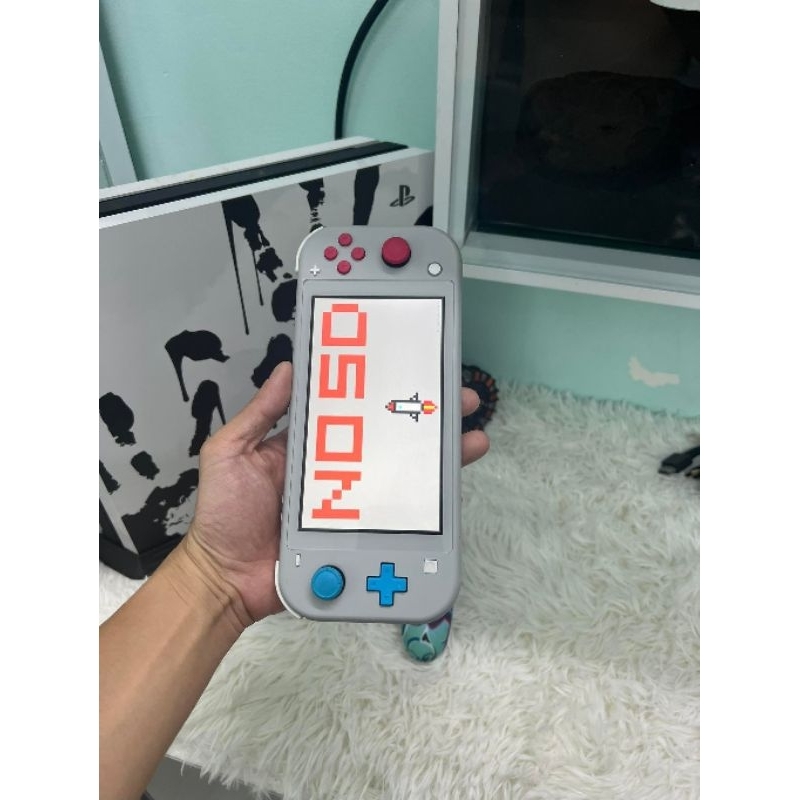 Nintendo Switch Lite - H@c Ám