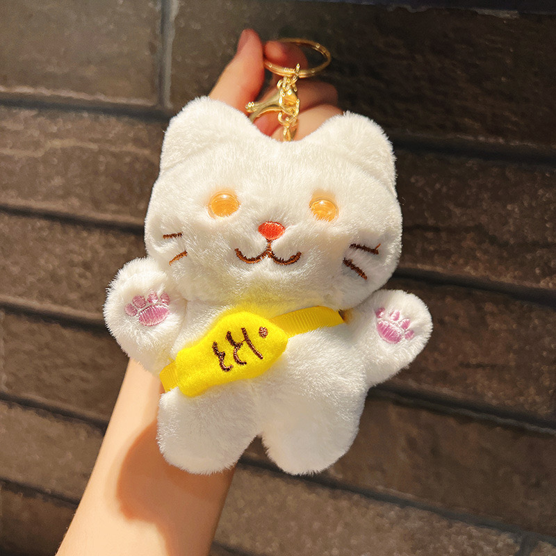 Móc khoá mèo đeo túi cá cao cấp nhồi bông siêu dễ thương