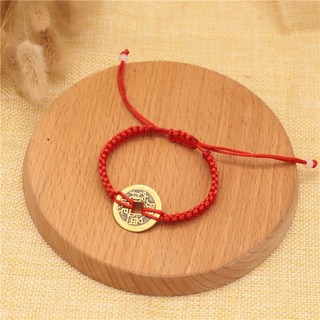 Vòng tay chỉ đỏ đồng xu may mắn