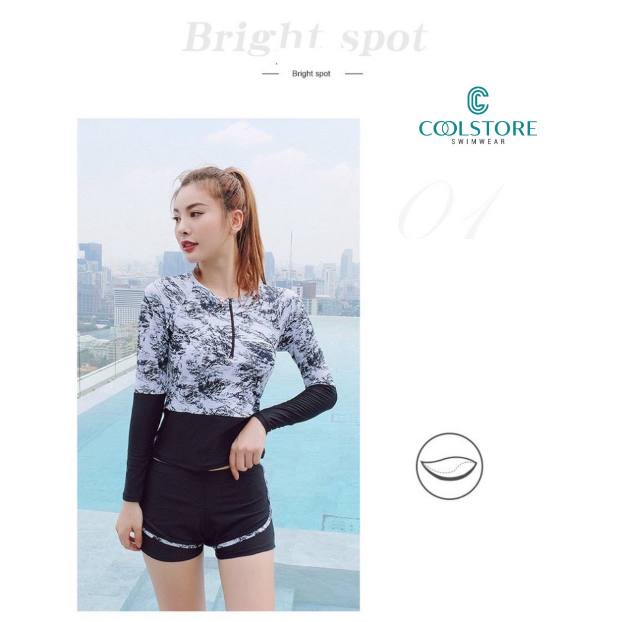 Bộ đồ bơi quần đùi, áo dài tay kín đáo che tia cực tím