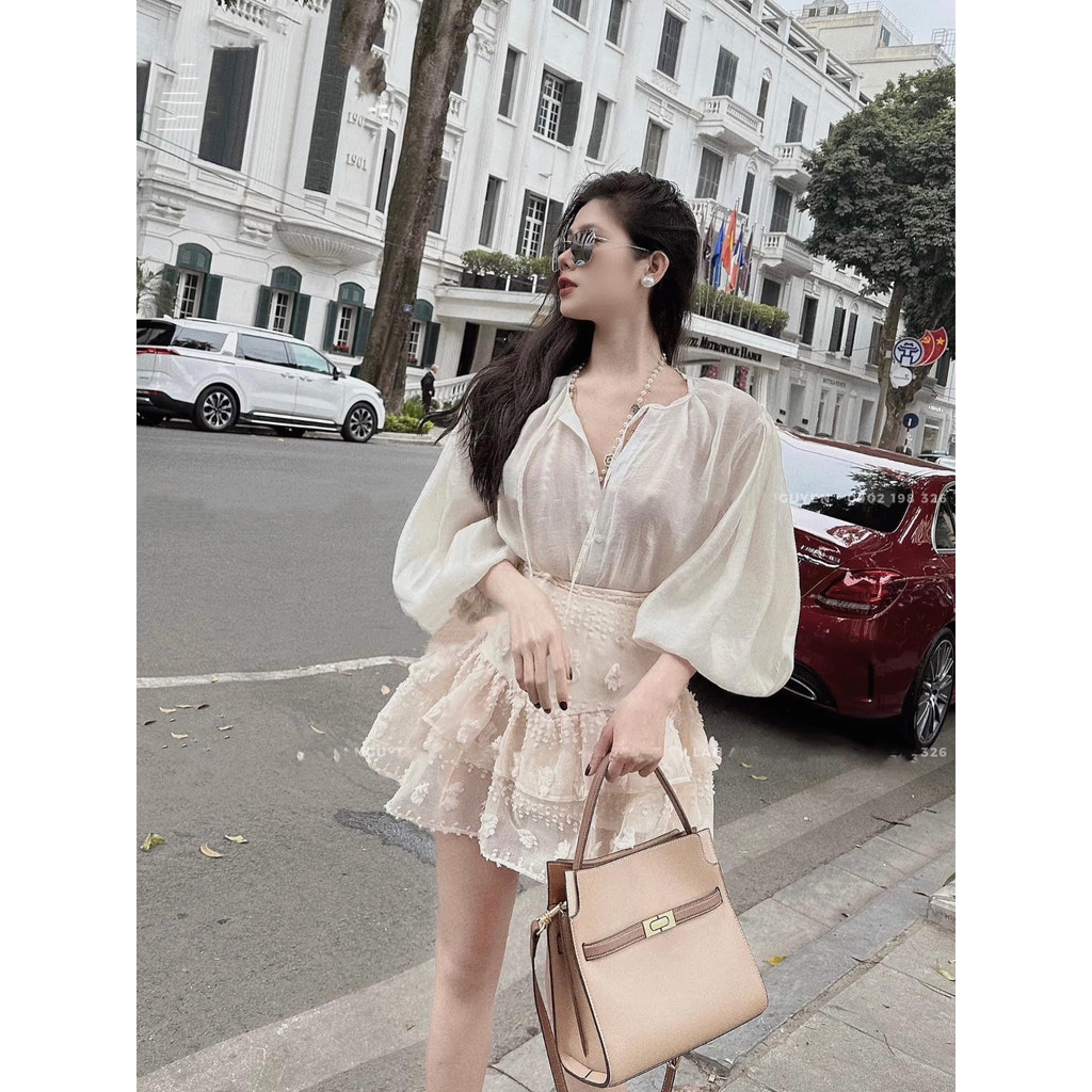 Set áo tay dài bồng + chân váy xòe hoa nổi