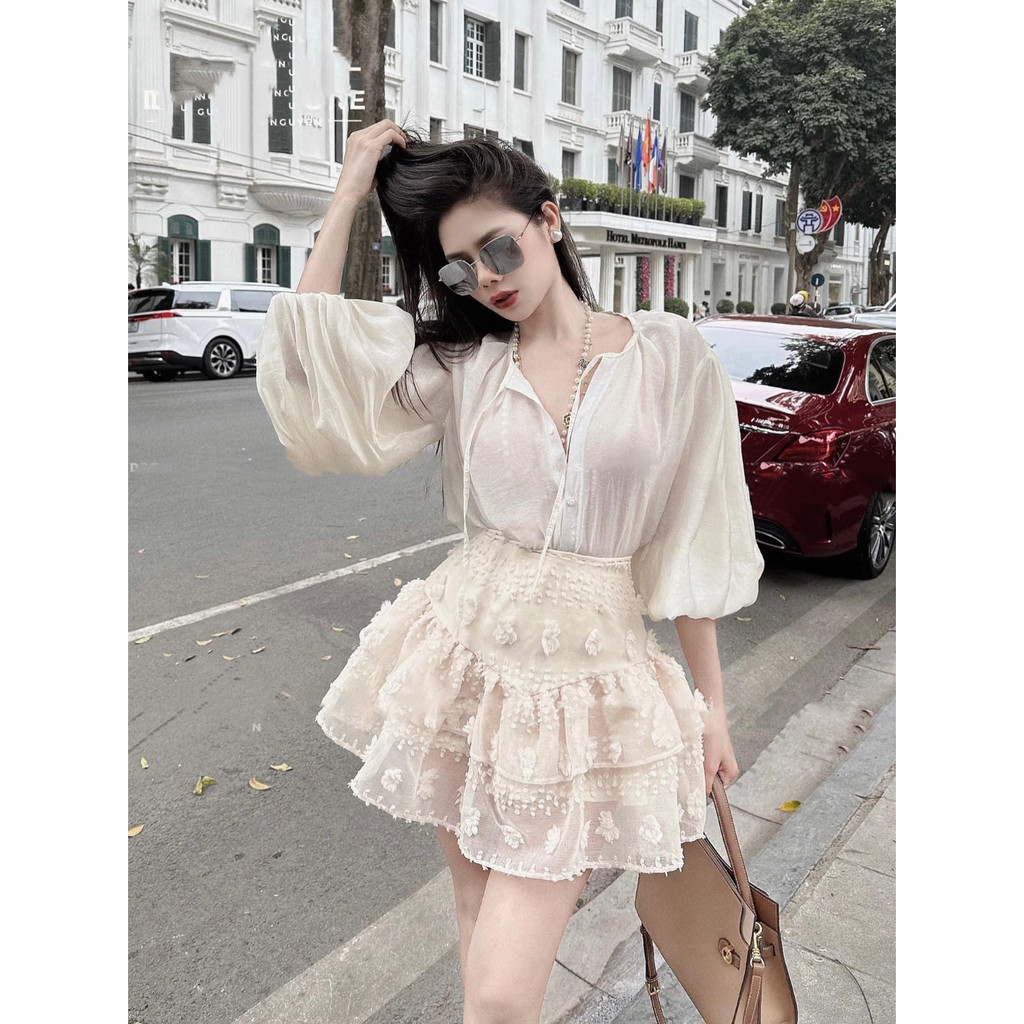 Set áo tay dài bồng + chân váy xòe hoa nổi