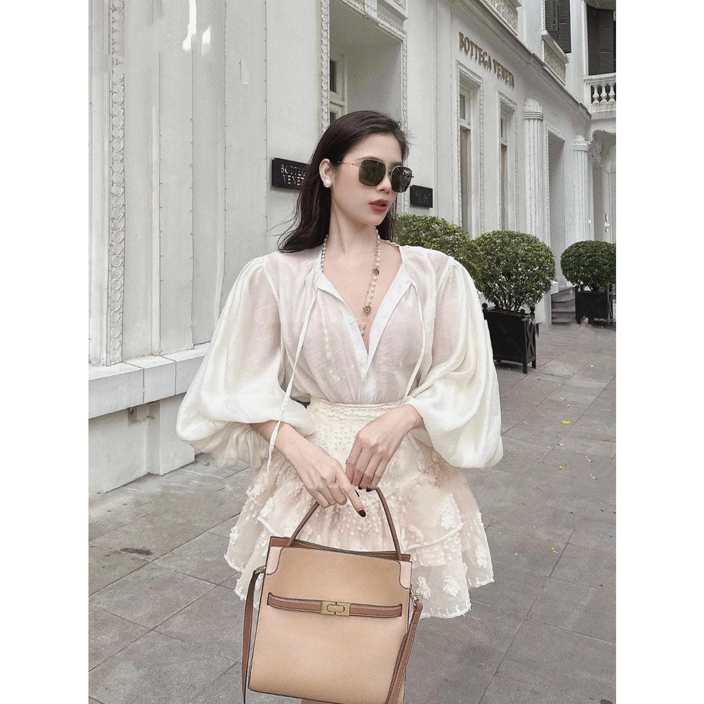 Set áo tay dài bồng + chân váy xòe hoa nổi