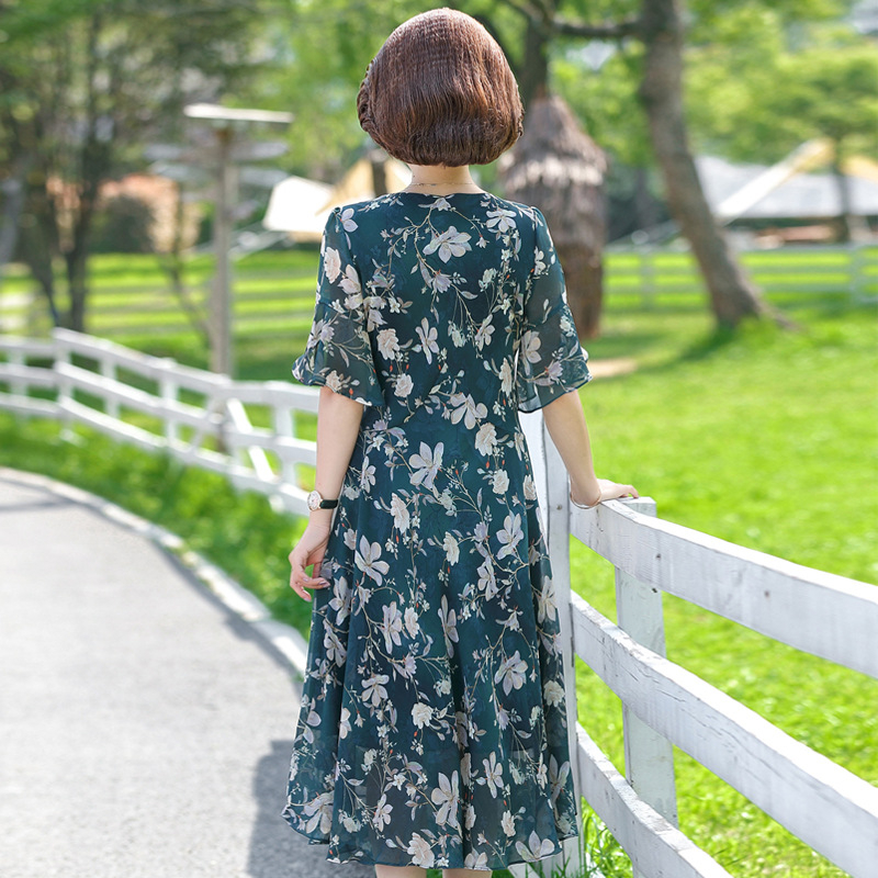 Đầm trung niên , Váy trung niên sang trọng cho mẹ U40,U50, che khuyết điểm, dáng xòe hoa xanh