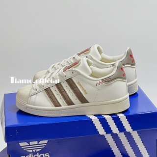 Giày Thể Thao Sneaker Adi,das Super Star Mũi Sò Đế Cao Màu Be Kem Sọc Nâu Cho Nam Nữ