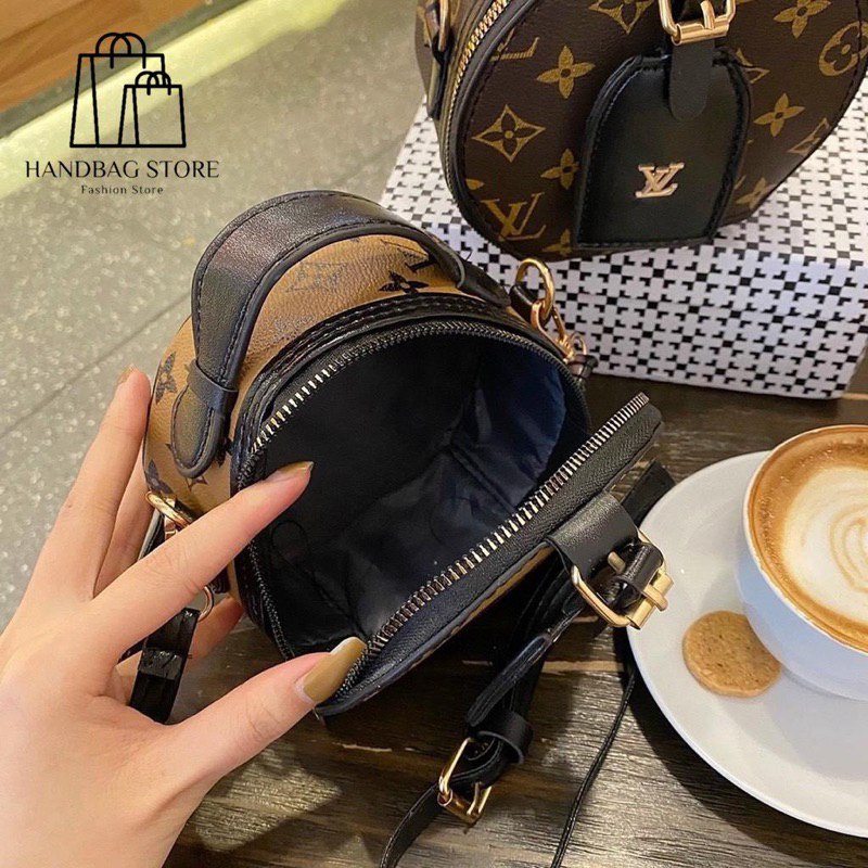 Túi xách đeo chéo Tròn quai đen Hoạ Tiết