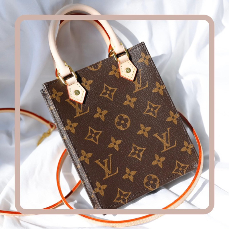 Túi xách mini hoa nâu kèm dây charm