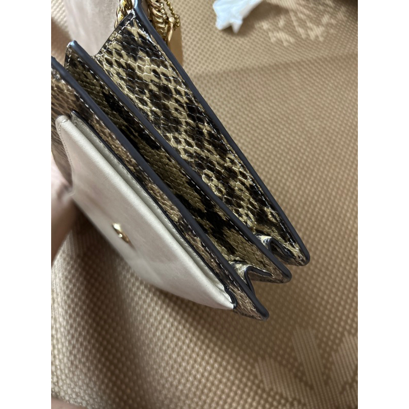 Túi đeo chéo coach