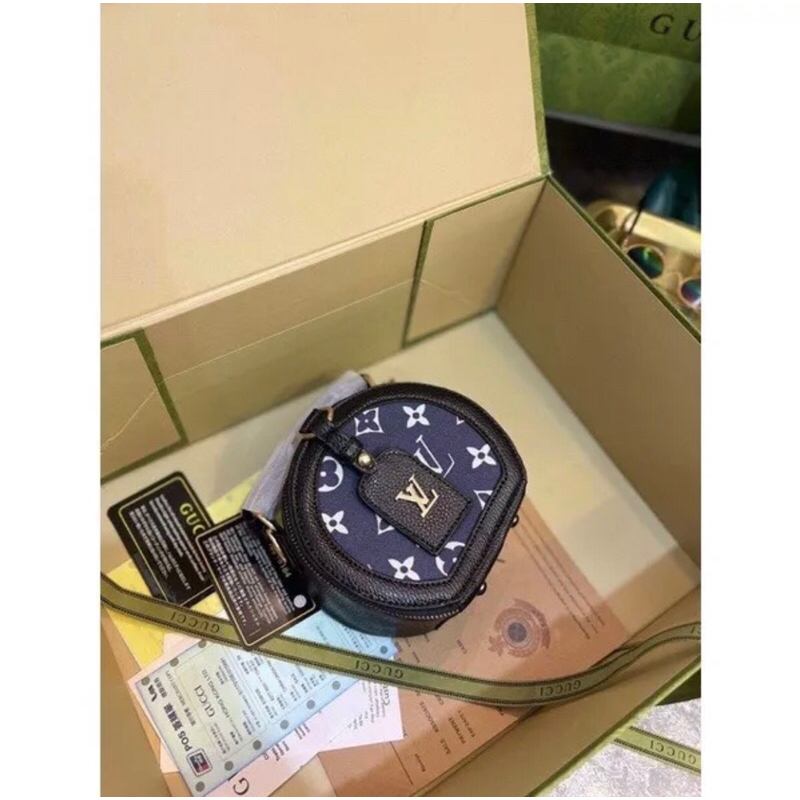 Túi cốp tròn da giả bò hoạ tiết mới 2023