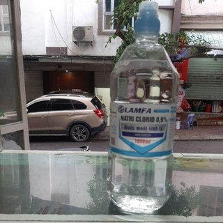 Nước muối sinh lí súc miệng