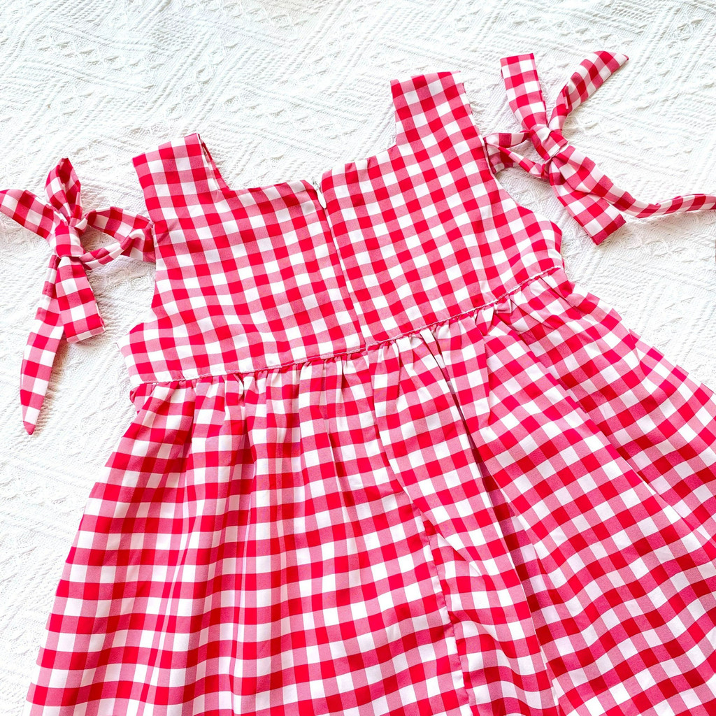 Váy cho bé gái sát nách hoạ tiết caro thắt nơ xinh - Thời trang Handy