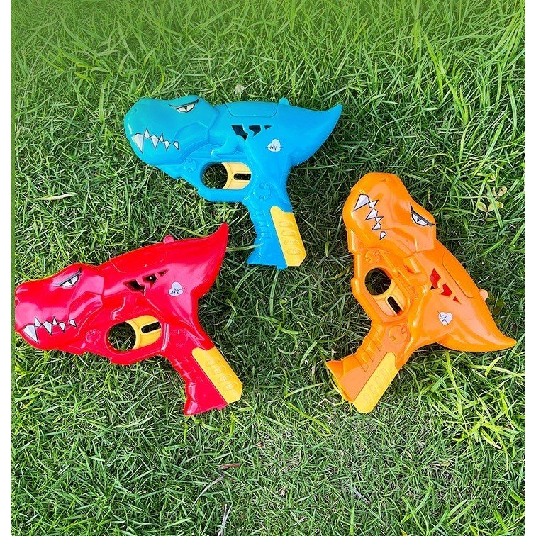 Kẹo đồ chơi 3in1 súng bắn kẹo khủng long gồm kẹo mút